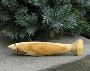 A 3.25" Scrimshaw Fish Carved In Bone. Appears To Show Good Age. The Carver Picked A Nice Piece Of Bone As The Coloration Lends Itself Well To The Likeness Of A Fish.