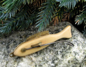 This Stunning Folk Art Lure Is Just 2.25″ Long And Is Carved From Ivory. Note How The Maker Fashioned A Single Piece Of Brass For The Line Tie And Dorsal Fin. The Hook Holder Passes Through The Body, Creating Pectoral Fins And The Eyes Of The Hooks Cleverly Mimic The Eyes Of A Minnow. The Maker Was As Talented A Craftsman As An Artist.