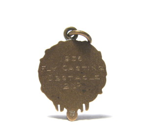 This Brass Medal Is Engraved " 1938, Fly Casting Obstacle, 2nd."