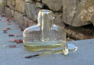 Note The Glass Stopper. The Brush Is Held By A Quill That Slides Over The Glass Rod
