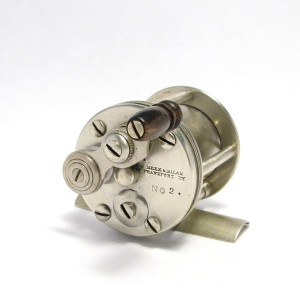 This #2 Size Meek & Milam Reel Has A Horn Knob And Click & Drag Switches