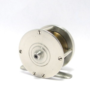 This Mystery Reel Is Just 1-7/8" In Diameter, Is Possibly Made From Monel Metal, Has Brass Spool Flanges And A Steel Arbor