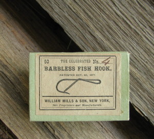 A Tiny Box Of William Mills & Son Patented Barbless Hooks. Circa 1877.