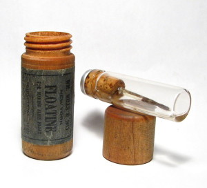 A Bottle Of William Mills & Son "Floatine" Dry Fly Oil With Its Protective Wooden Tube